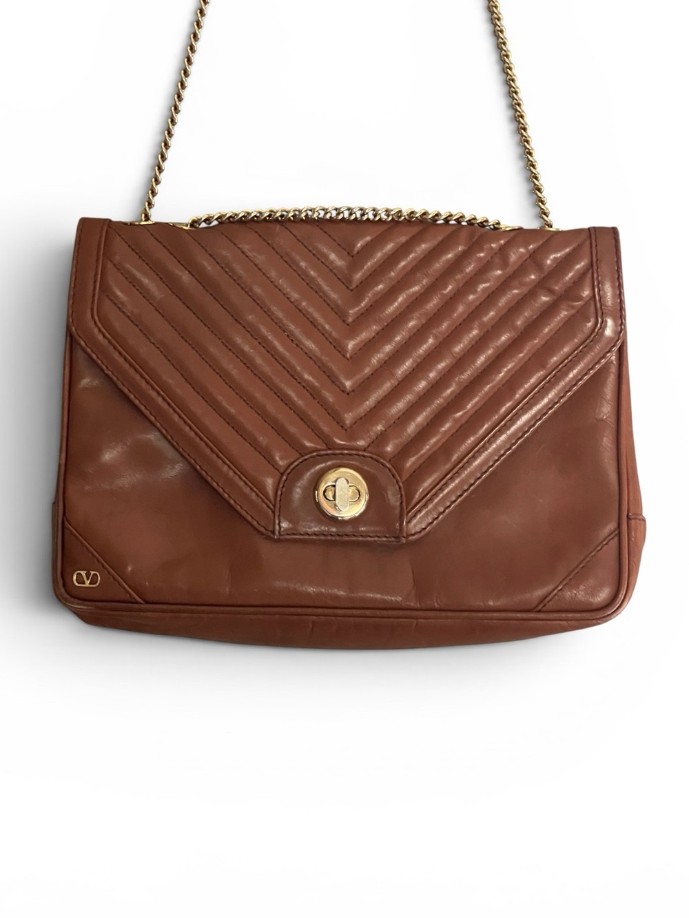 Vintage Valentino Garavani chevron-quilted leather flap shoulder bag.